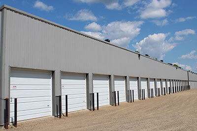 Personal Storage | Row of overhead garage doors at Strack's Self Storage in Randall, MN